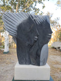 Faces Sculpture