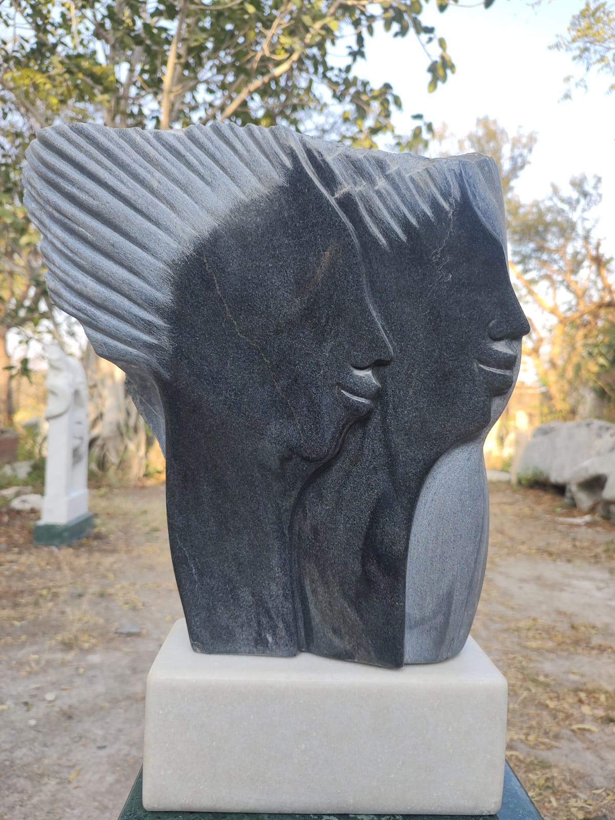 Faces Sculpture